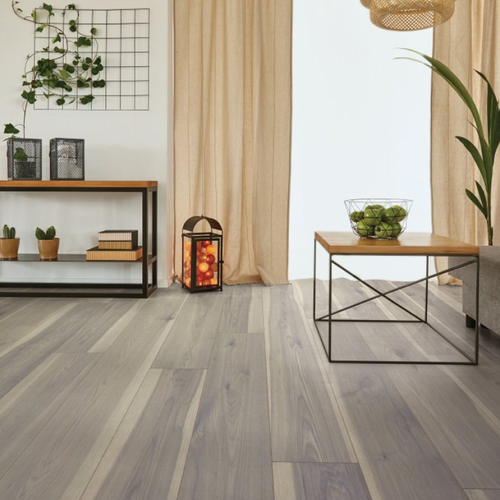 Living room with laminate flooring -  Hawk Drive - Fumed Hickory